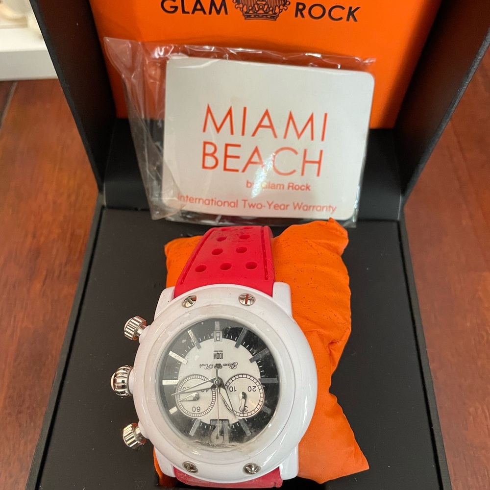 Unisex glam rock red band with white face never been used.